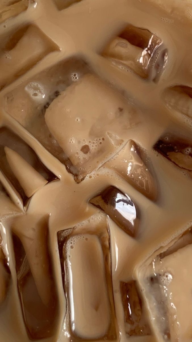 Instagram post by @mananamariee for NESCAFÉ. Caption reads: #NescafePartner Iced espresso ALL DAY; this recipe....