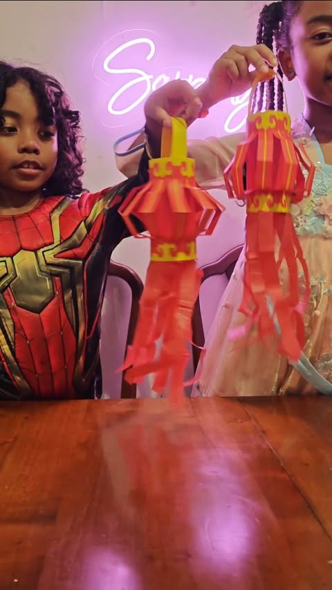 Instagram post by @mama.regz_ for Baker Ross. Caption reads: [...] Chinese lantern craft kit from @bakerross....