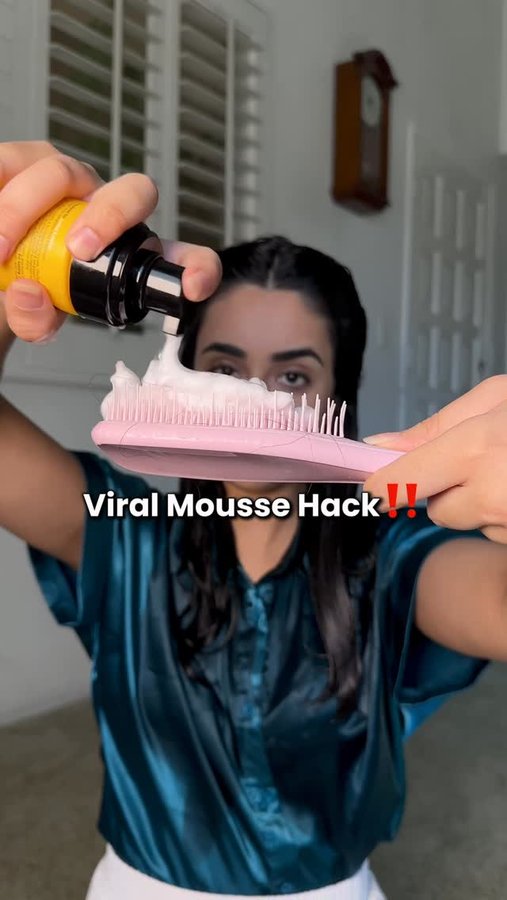 Instagram post by @sumans.waves for Curls Monthly. Caption reads: Have you tried this viral mousse hack yet?! It....