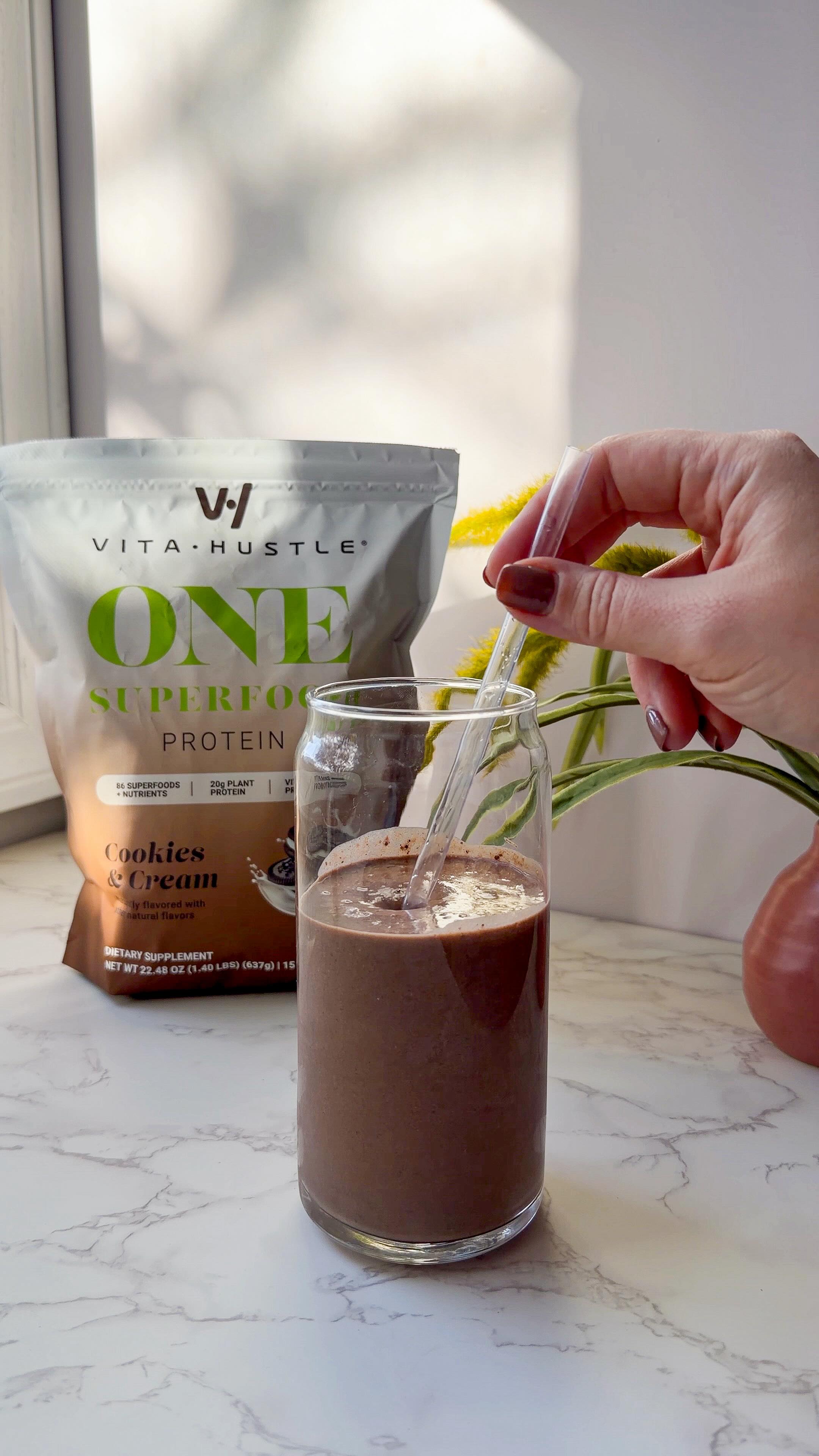 Instagram post by @the.mom.journal for VitaHustle. Caption reads: [...] #HealthyIndulgence #VitaHustle....