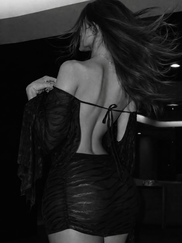 Instagram post by @aybukerdogannnn for REVOLVE. Caption reads: dream dress @revolve #ad #reklam.