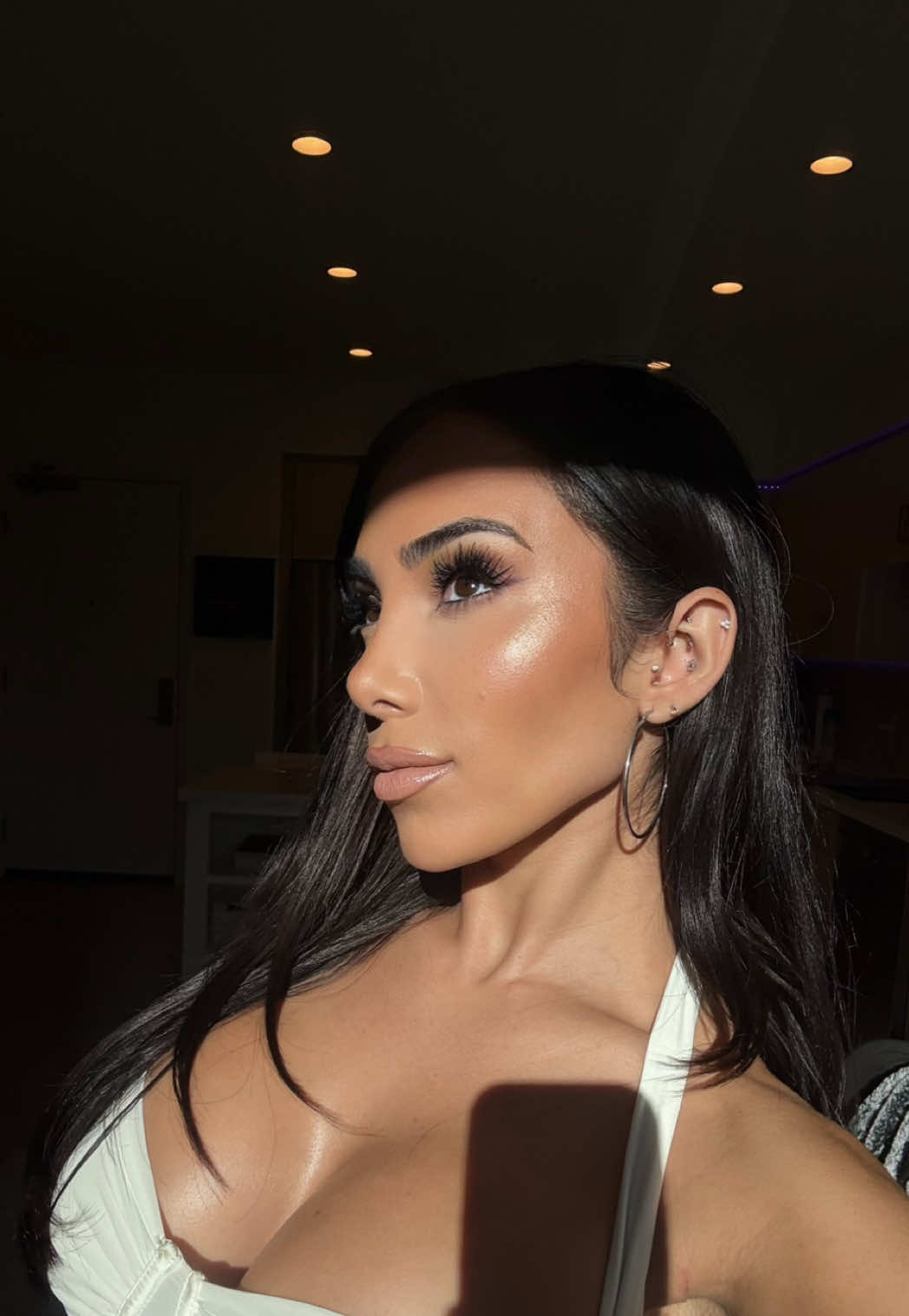 TikTok post by @racquelsymons for EM Cosmetics. Caption reads: @EM Cosmetics they’ll spot you miles and miles....