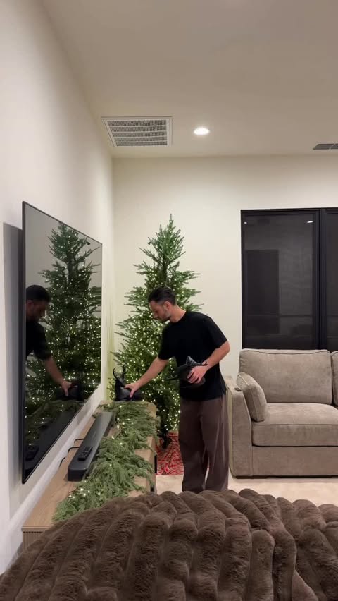 Instagram post by @theeverythingdad for Lovesac. Caption reads: #lovesacpartner The holidays can get loud and....