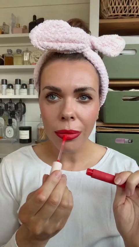 Instagram post by @lauraloumakeup for BY TERRY. Caption reads: [...] @dcypherbeauty custom glow booster *....