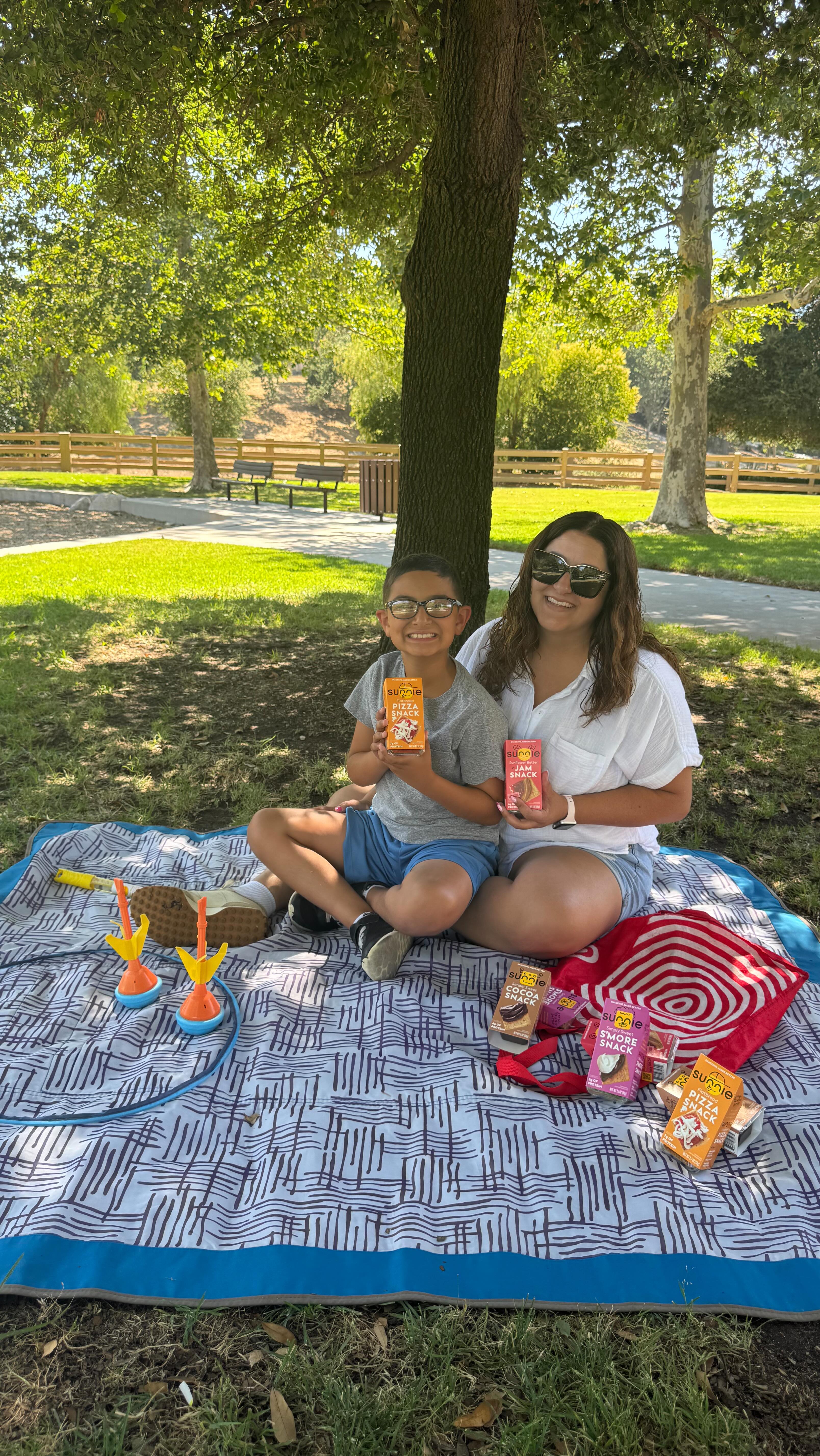 Instagram post by @mamachitchat for Target. Caption reads: Guess what, friends? Our favorite snack—Sunnie....