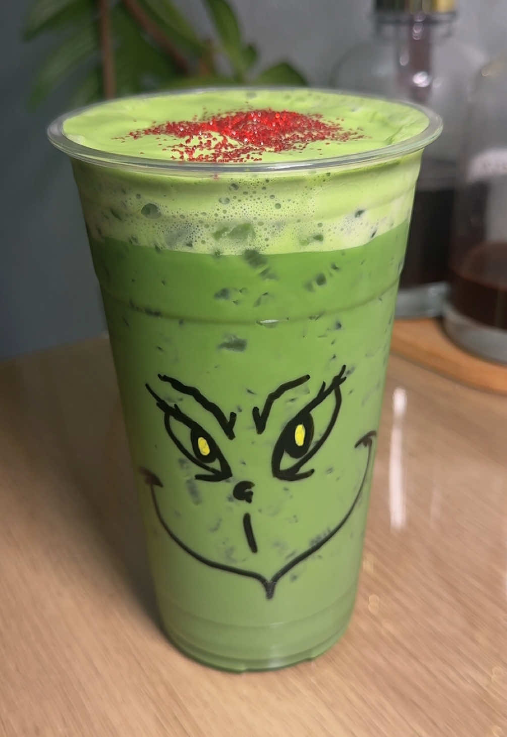 TikTok post by @matcha.mama.sav for Chazoku. Caption reads: [...] a hand drawn Grinch by yours truly✍🏻....