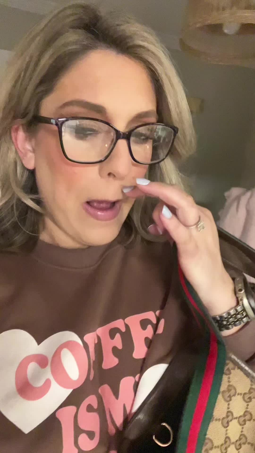 TikTok post by @sydneydanielle33 for L’ange Hair. Caption reads: [...] on a stick. I'm obsessed! @langehair....