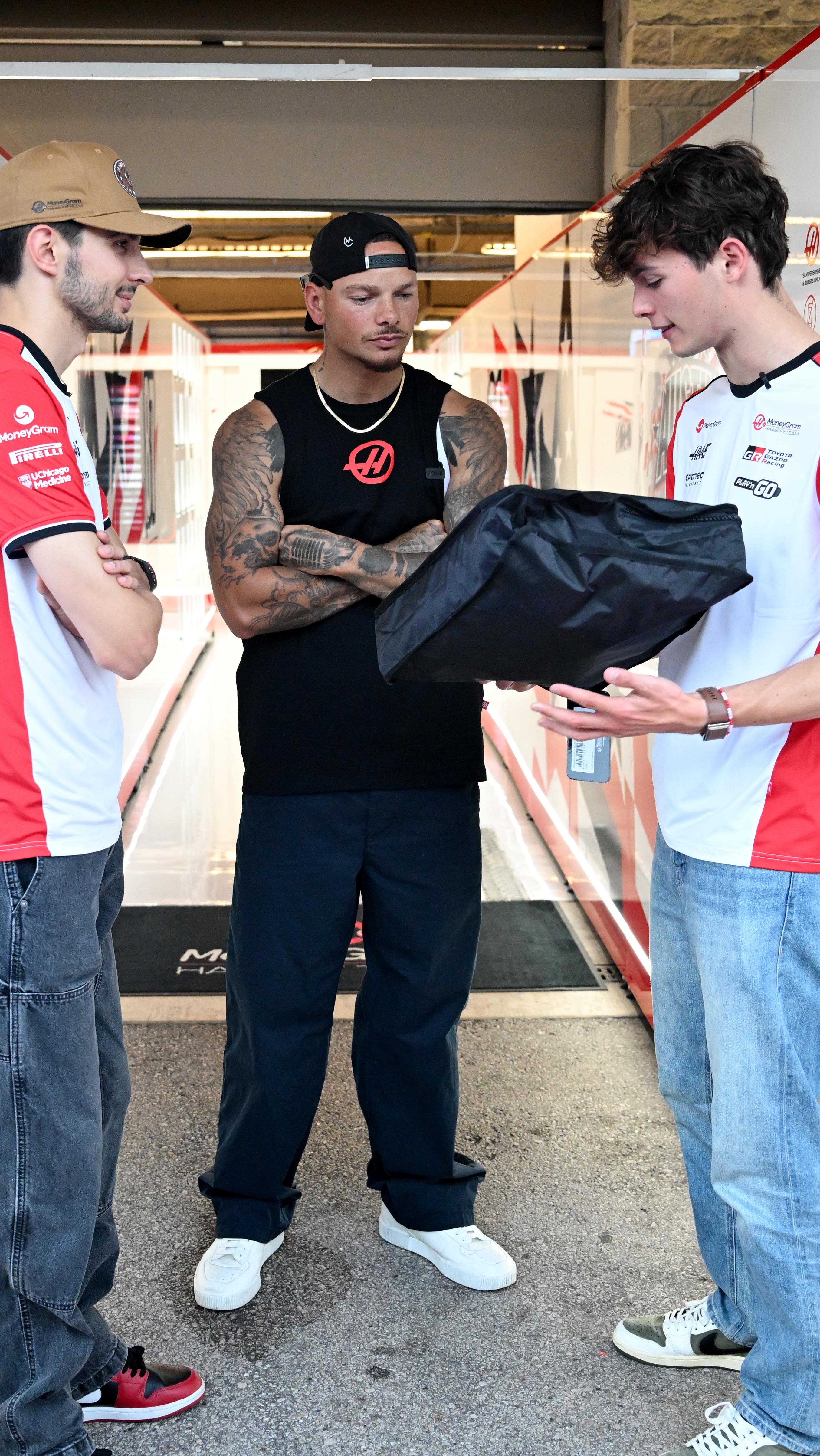 Instagram post by @kanebrownfamily for Lucchese. Caption reads: Some new boots for Bearcon 🤠

#HaasF1 #F1 #USGP.