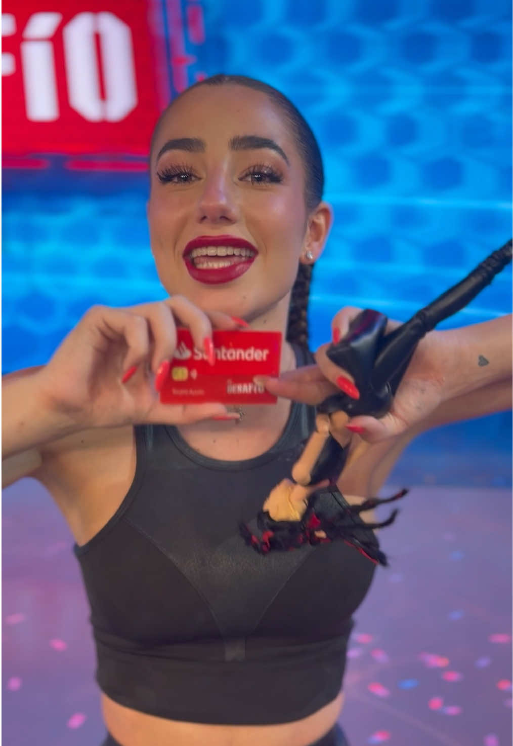 TikTok post by @eldesafioa3 for Santander. Caption reads: @Lola Lolita🌸 dona la Tarjeta Ayuda....