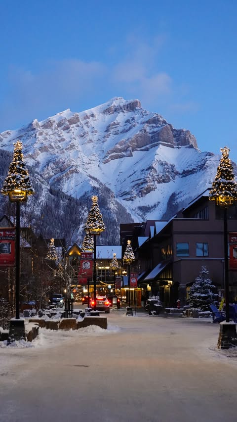 Instagram post by @samanthalreid for Travel Alberta. Caption reads: Get ready to experience pure holiday magic in the....