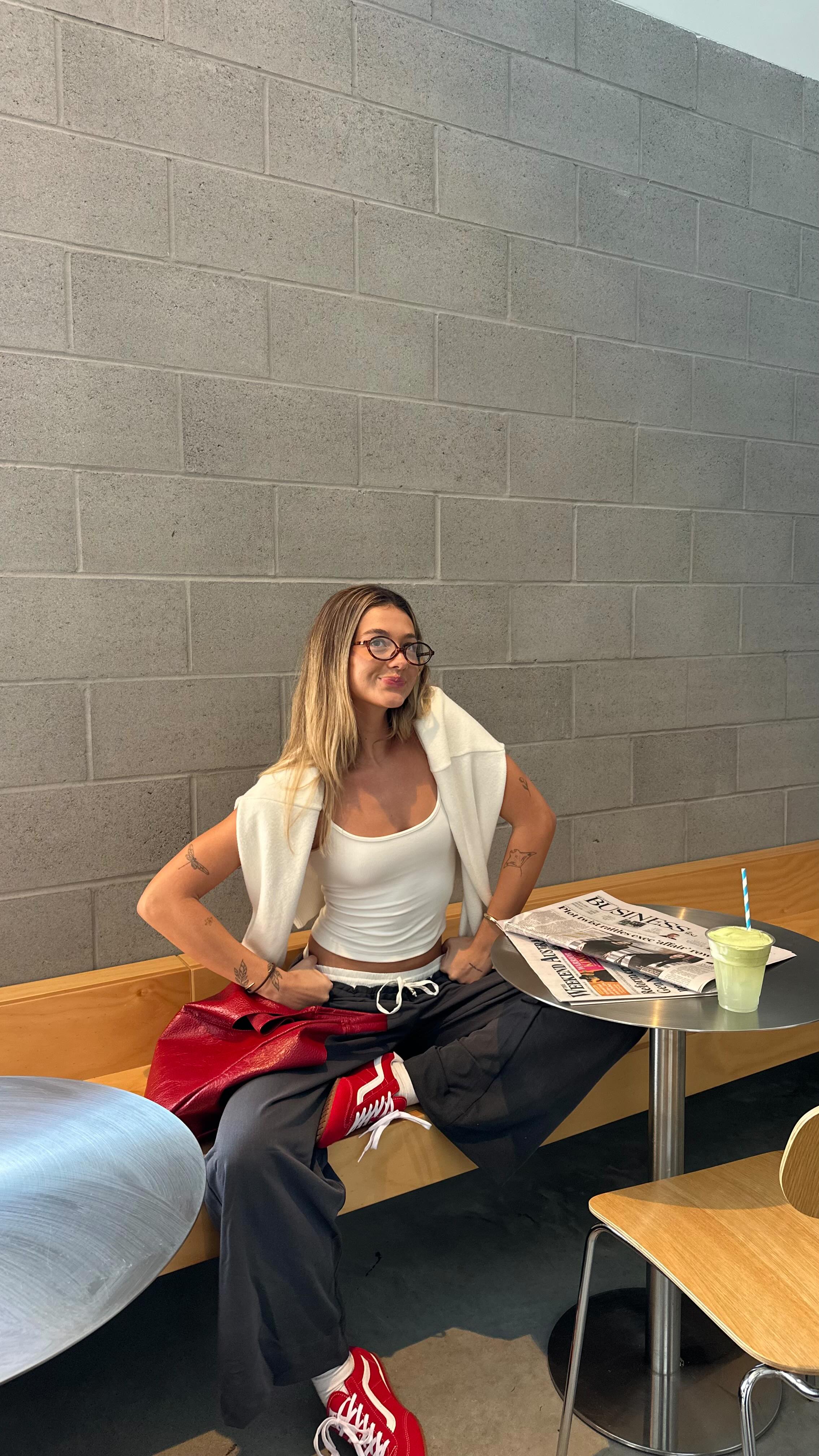 Instagram post by @paigeesade_ for Universal Store. Caption reads: [...] night out inspo ⭐️👜🫒🐆 wearing....