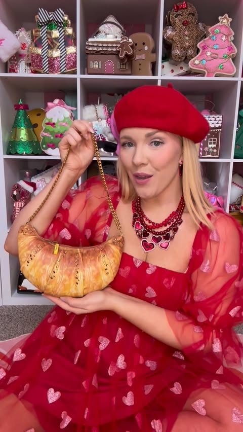 Instagram post by @moriahlovespurses for Betsey Johnson. Caption reads: [...] for Valentine’s Day! 💝💐🥐🍫🧸....