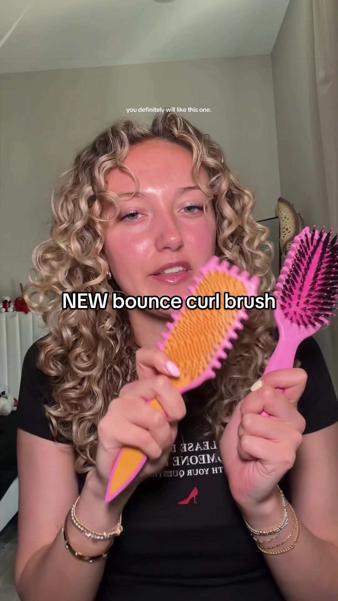 TikTok post by @hannahhnotmontanaa for BounceCurl. Caption reads: [...] it down since I got it 🤭 @BounceCurl #curly....