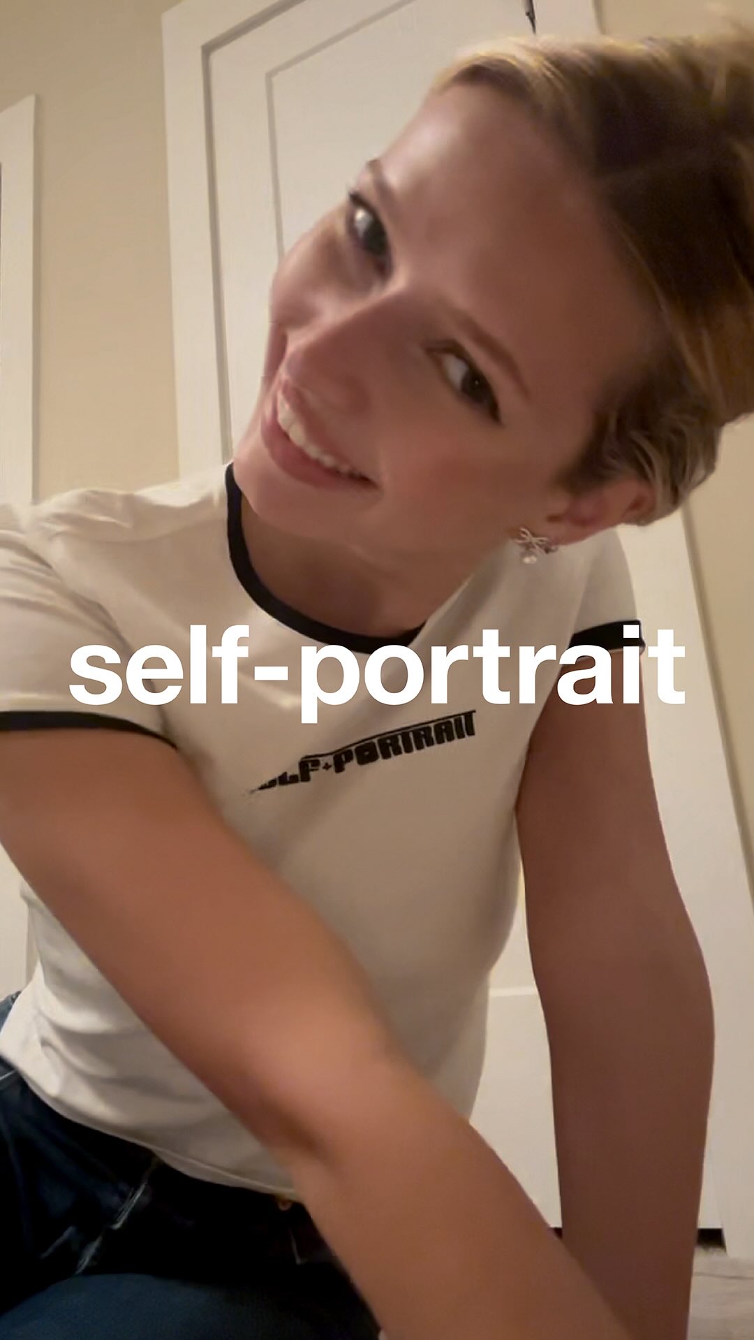 Instagram post by @applemartin for SELF-PORTRAIT. Caption reads: Our new Miss self-portrait

🎥 by @applemartin.