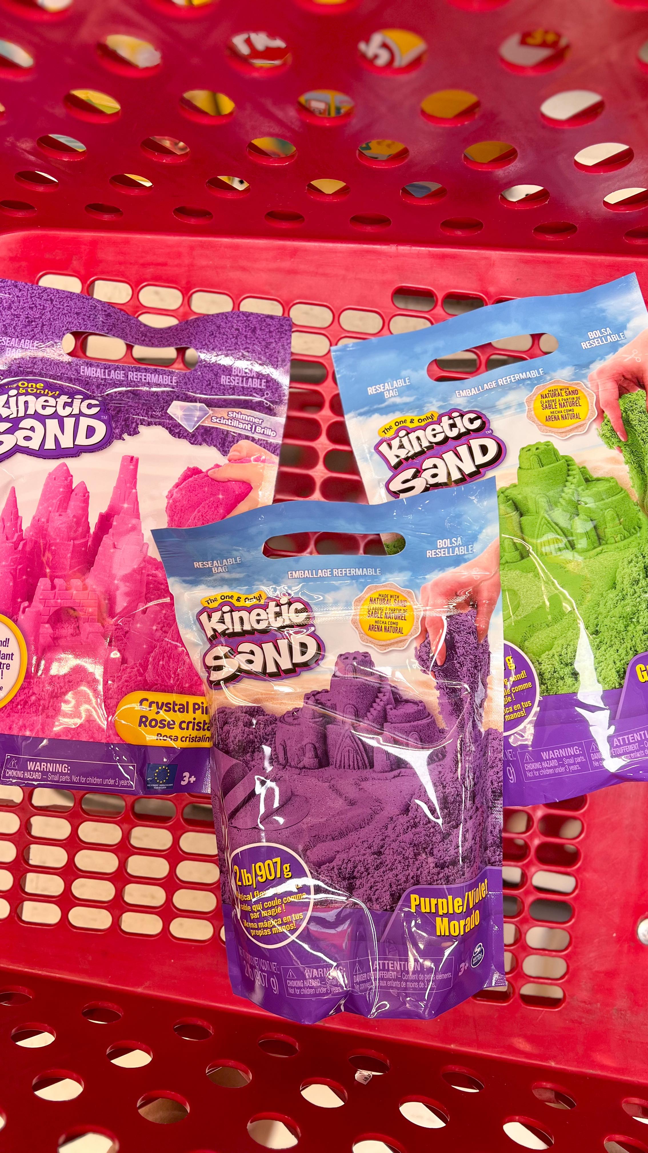 Instagram post by @target_junkie for Kinetic Sand. Caption reads: [...] and keep my kids engaged, and @KineticSand....