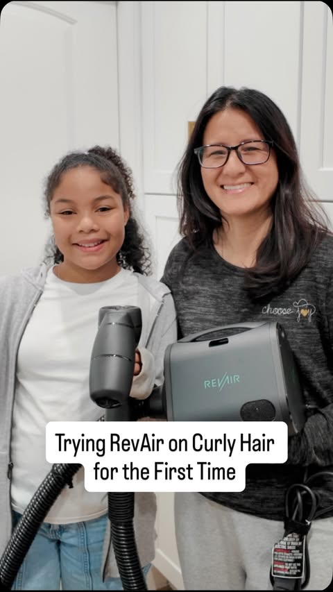 Instagram post by @ourfamilyvine for RevAir • Reverse-Air Dryer. Caption reads: @myrevair on curly hair for the first time and was....