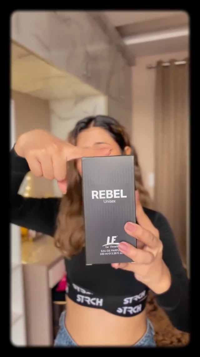Instagram post by @anjaliscents for La'French Perfume. Caption reads: In just ₹599 Rebel from @lafrenchperfumes is....