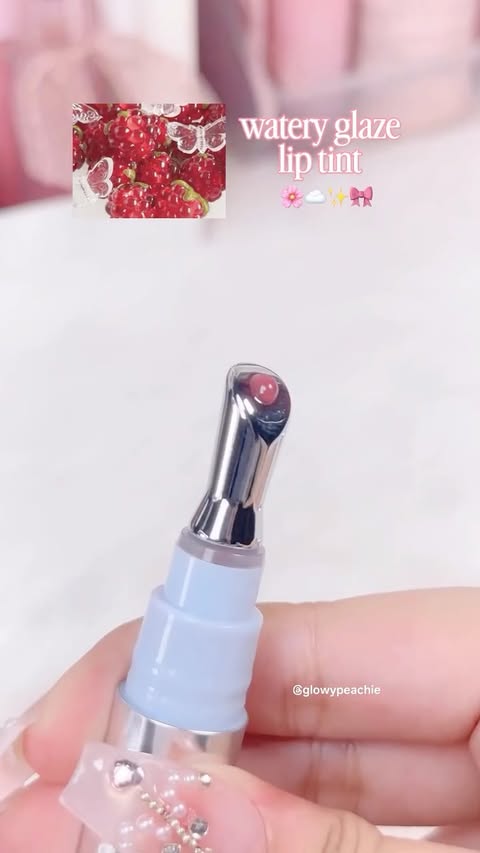 Instagram post by @glowypeachie for Judydoll. Caption reads: Judydoll watery essence lip glaze in shade G04....