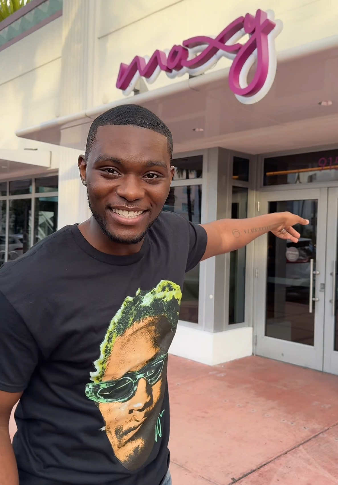 TikTok post by @tyshonlawrence for Moxy Hotels. Caption reads: Im in miami staying @Moxy Hotels and I had to give....