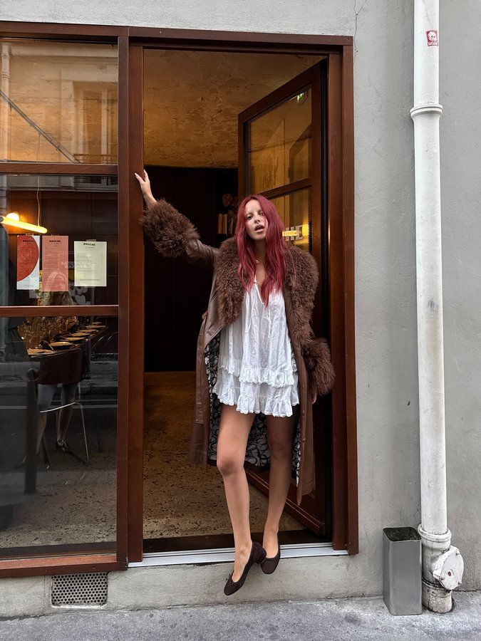 Instagram post by @mariegaguech for Jonak. Caption reads: Debuting my new red hair at my @jonak dinner with....