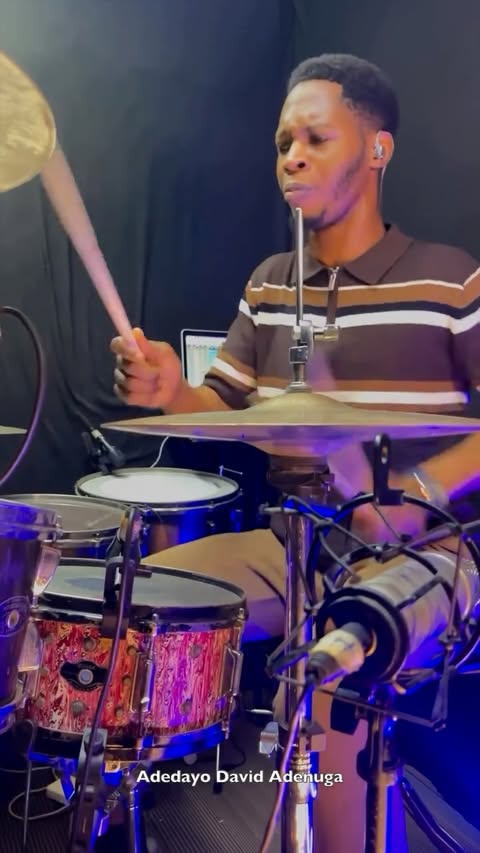 Instagram post by @gbenga.akinfenwa for EVANS Drumheads. Caption reads: [...] #ZildjianFamily #TeamEvans #evansdrumheads....