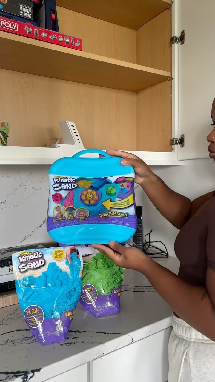 Instagram post by @desireeelisha for Kinetic Sand. Caption reads: WHEN IT COMES TO CREATIVITY AND FUN @kineticsand....