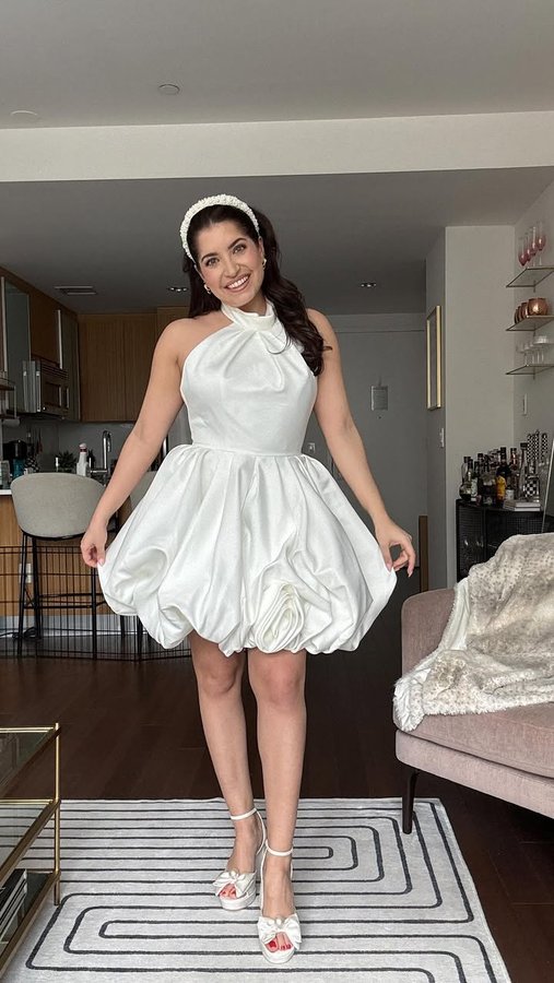 Instagram post by @kelseybarberio for Mac Duggal. Caption reads: This white @macduggal mini is the perfect blend of....