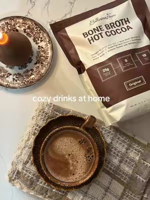 TikTok post by @dianatowerss for Ballerina Farm. Caption reads: [...] #cozydrinks #cozyathome #hotcocoa....