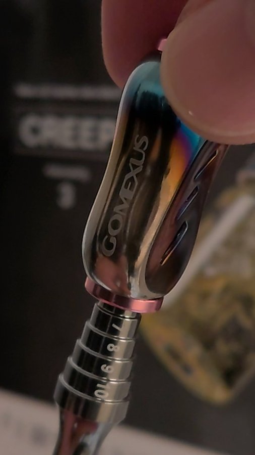 Instagram post by @masa10_x for Gomexus. Caption reads: Gomexus titanium handle knob and glitch oil [...].