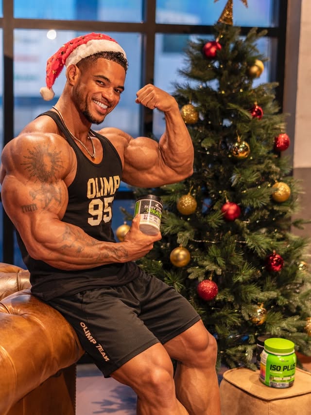 Instagram post by @eltonpintomota for Olimp Sport Nutrition. Caption reads: 🎅🏾 🎄Merry Christmas from me and....