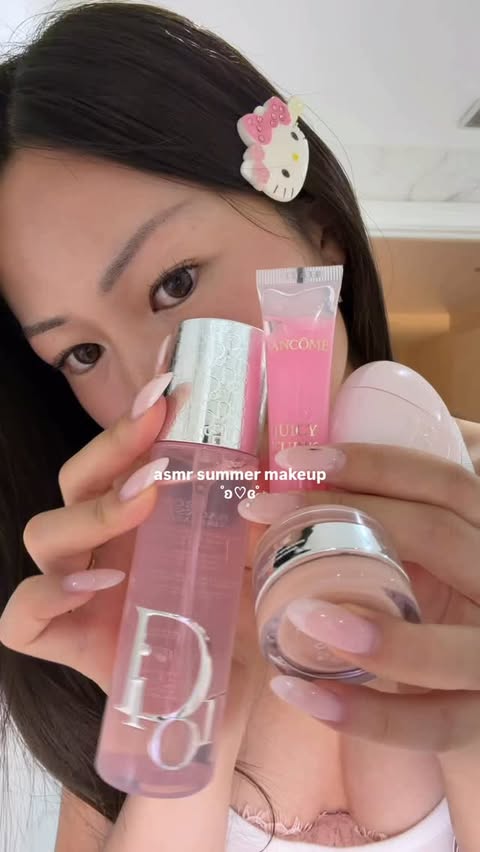Instagram post by @olafflee for GLOW. Caption reads: ad asmr glowy summer makeup routine ˚ʚ♡ɞ˚ products....