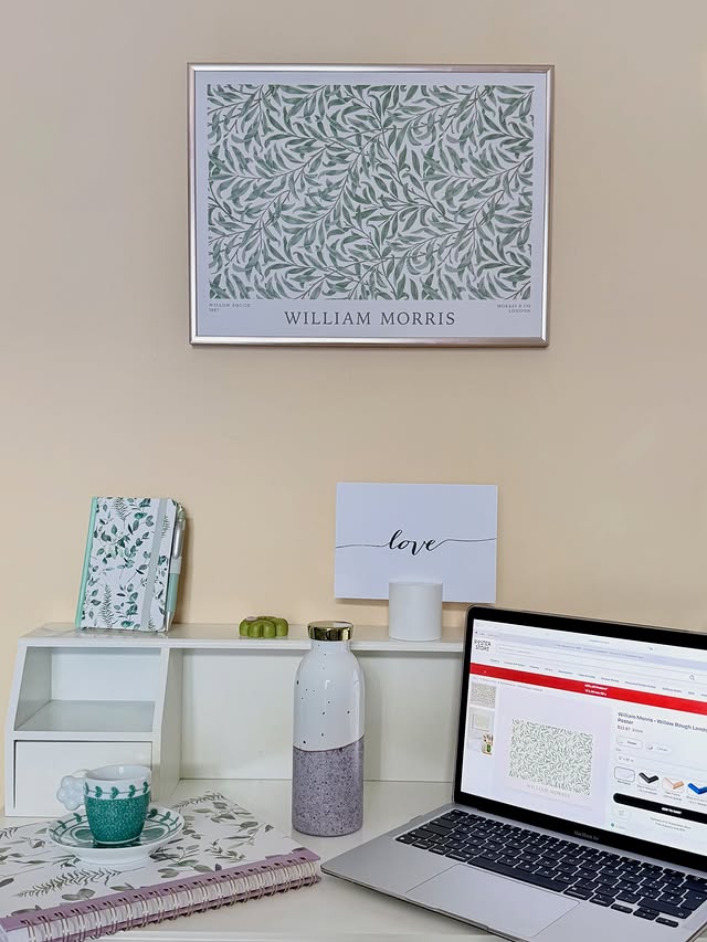 Instagram post by @ladyessegici for Poster Store. Caption reads: Elevating my #workspace with @posterstore William....