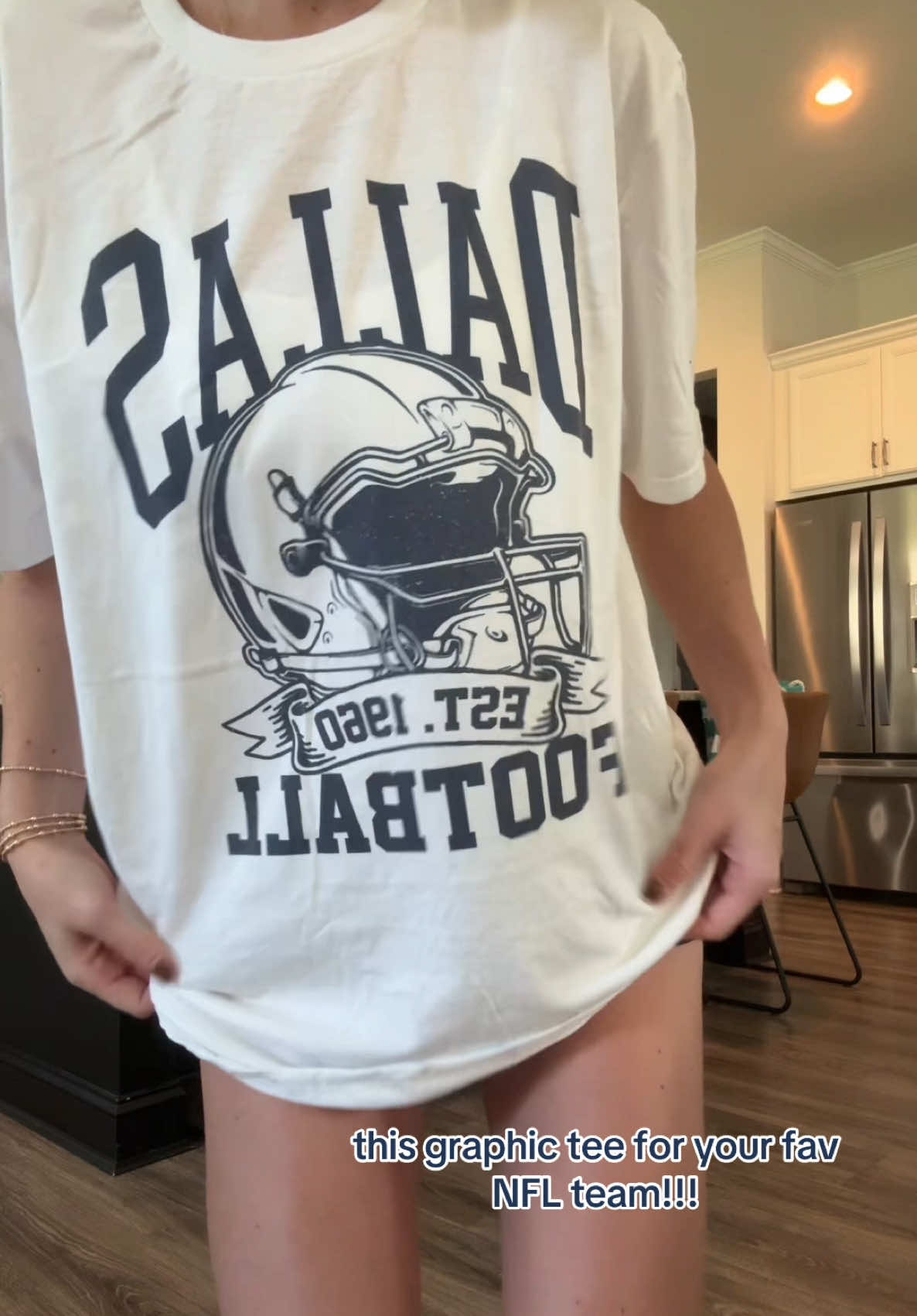 TikTok post by @emmalivslife for PartyOnShop. Caption reads: graphic tees are my favvvv rn @PartyOnShop....