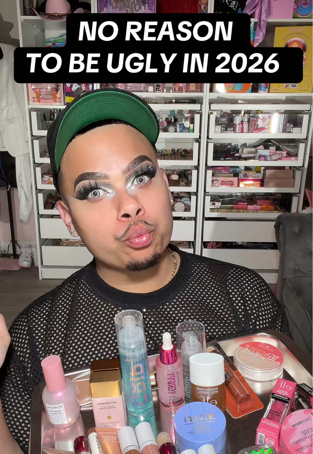 TikTok post by @theeblingkingoffical for MCoBeauty. Caption reads: [...] liquid liner @Bad & Boujee Beauty  Glow....