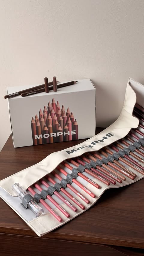 Instagram post by @addict_to_beauty_ for Morphe. Caption reads: A whole wardrobe of lip liners 😍💋 Morphe’s Lip....
