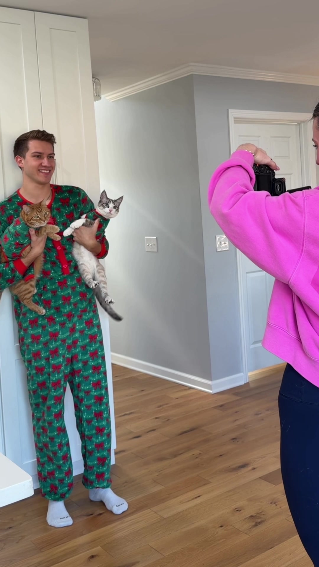 TikTok post by @abrameng for PetSmart. Caption reads: Holiday card with Kurt & Gary 😸🎄 @PetSmart....