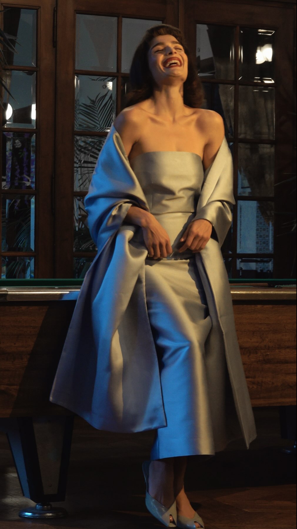 Instagram post by @marimiqadzze for NET-A-PORTER. Caption reads: Midnight magic, soft sparkles, and champagne – it....