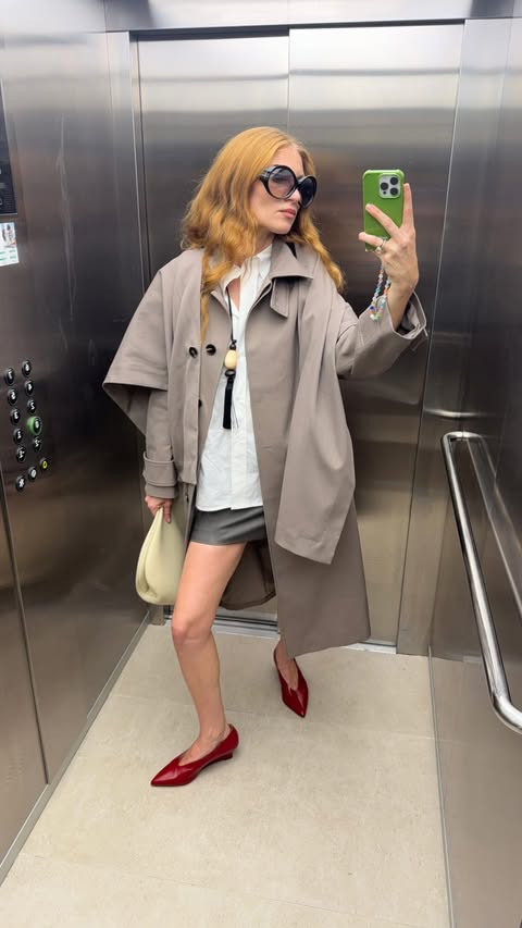 Instagram post by @lisa__mase for Sézane. Caption reads: I heard it’s trenchcoat season 👽 styling a....
