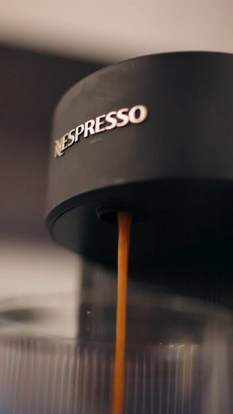 Instagram post by @iamkamaribonds for Nespresso. Caption reads: [...] warm-up and cool down with @nespressousa....