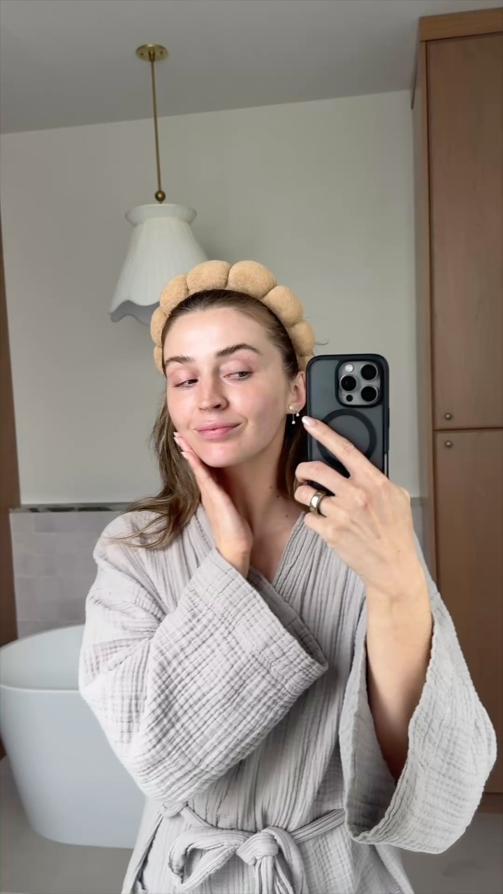 Instagram post by @drkatiebeleznay for SkinCeuticals. Caption reads: Glowing skin for summer 🌞 a fresh IPL laser with....