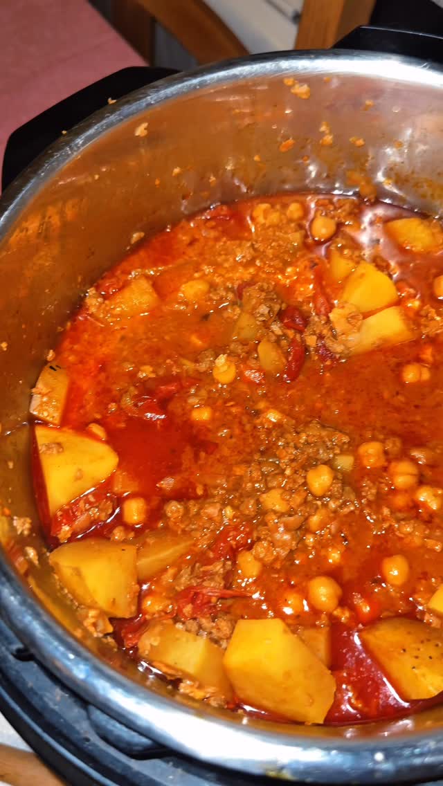 Instagram post by @nicoleleeanne6 for Impossible Foods. Caption reads: It’s giving vegan taco stew in the very BEST way ....