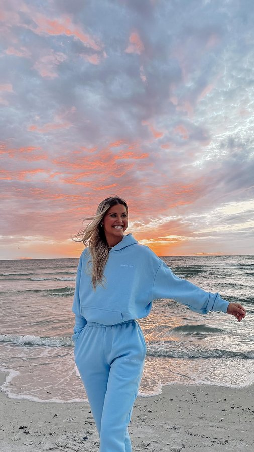Instagram post by @meg.mcclure for Elevated Faith. Caption reads: last nights sunset 🌸⛅️🌊 Set from @elevatedfaith....