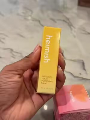 TikTok post by @suminadas97 for Heimish. Caption reads: [...] smooth, and plump-looking lips 24/7.....