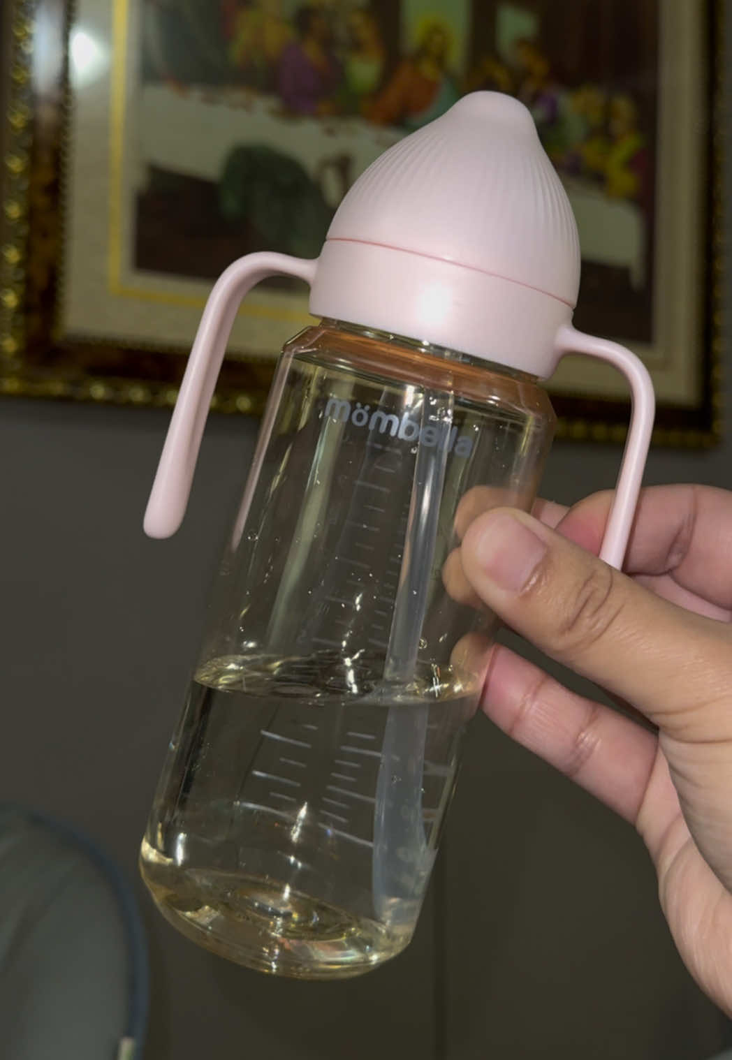 TikTok post by @jessica.pim for mombella official. Caption reads: The best transitioning cup @MombellaUS #milestone....