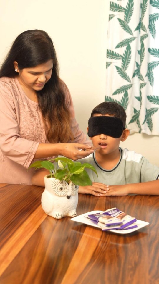 Instagram post by @mishprimadonna for Cadbury Dairy Milk. Caption reads: #ad 
A little game, a blindfold, and lots of....