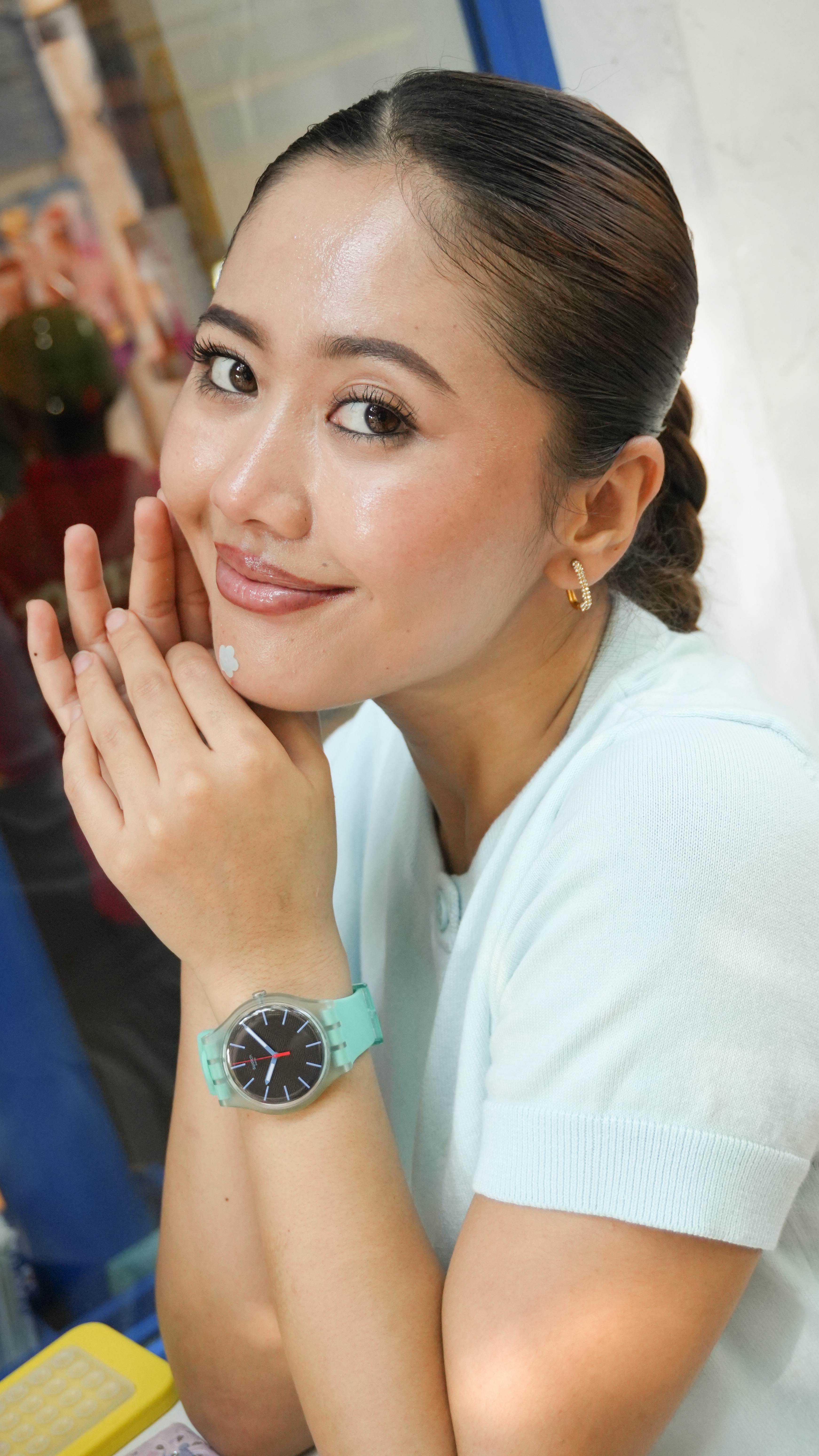 Instagram post by @triyata_ch for Swatch. Caption reads: Color, fun, and endless sunshine, the Swatch....