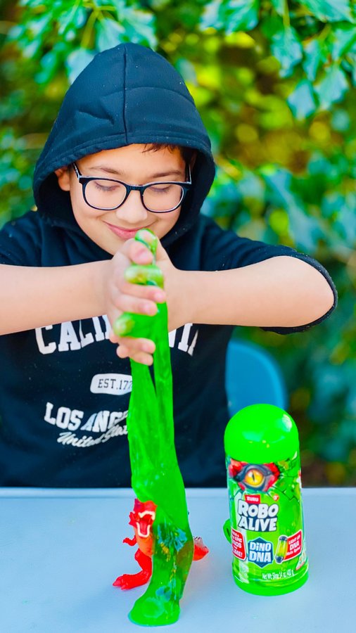 Instagram post by an influencer for ZURU Toys. Caption reads: Unboxing the New Zuru Robo Alive Dino DNA Open the....