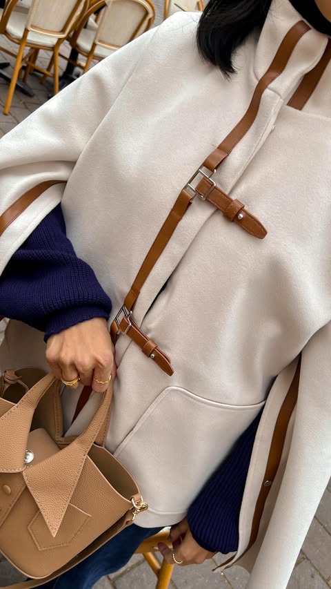 Instagram post by @maggiefcolin for Uoozee. Caption reads: Effortless layers, strong silhouette…....