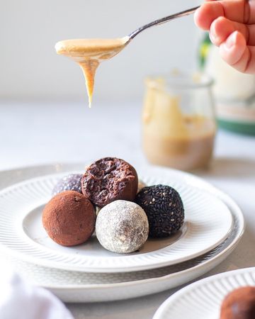 Instagram post by @olesiaguts.nutrition for Botanica Health. Caption reads: Chocolate-Tahini Protein Balls🍫
⠀
I’m always....