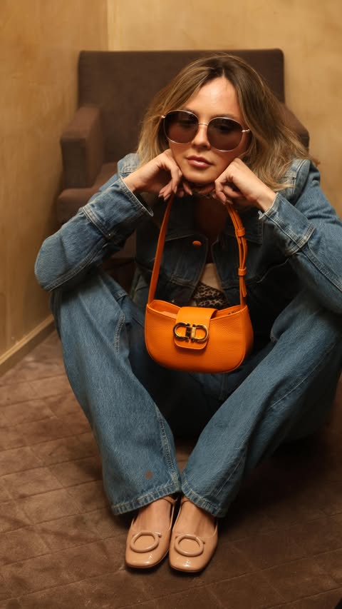 Instagram post by @butmynameisdanielle for FERRAGAMO. Caption reads: Needed a Hug, found one at @ferragamo instead....